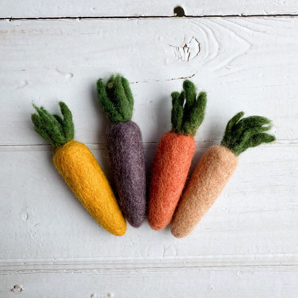 Felt mini heirloom carrots available from a small shop in Canada. 