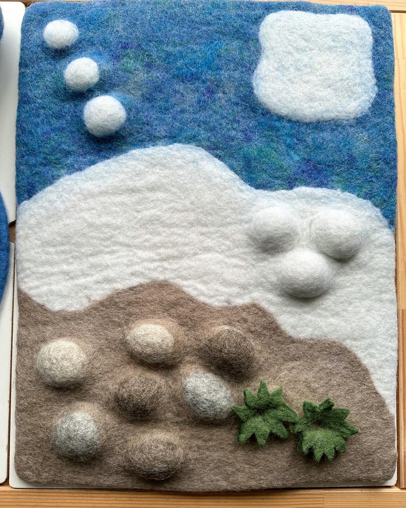 Felt Arctic tundra play mat landscape play available from a small shop in Canada. 