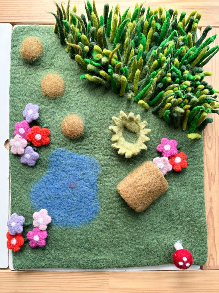 Felt bug play mat landscape available from a small shop in Canada. 