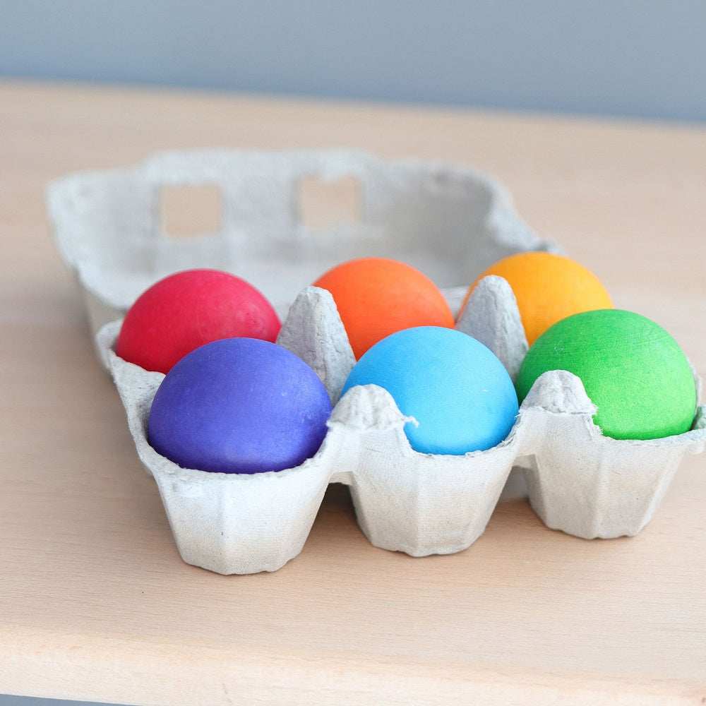 Grimms wooden balls in rainbow colours for color sorting or balls runs 