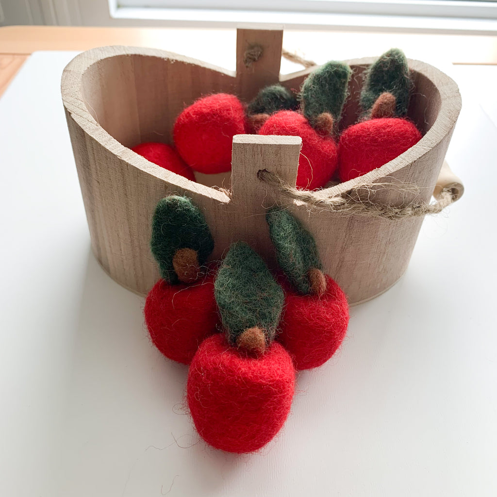 Wooden apple basket filled with mini felt apples available from a small shop in Canada 