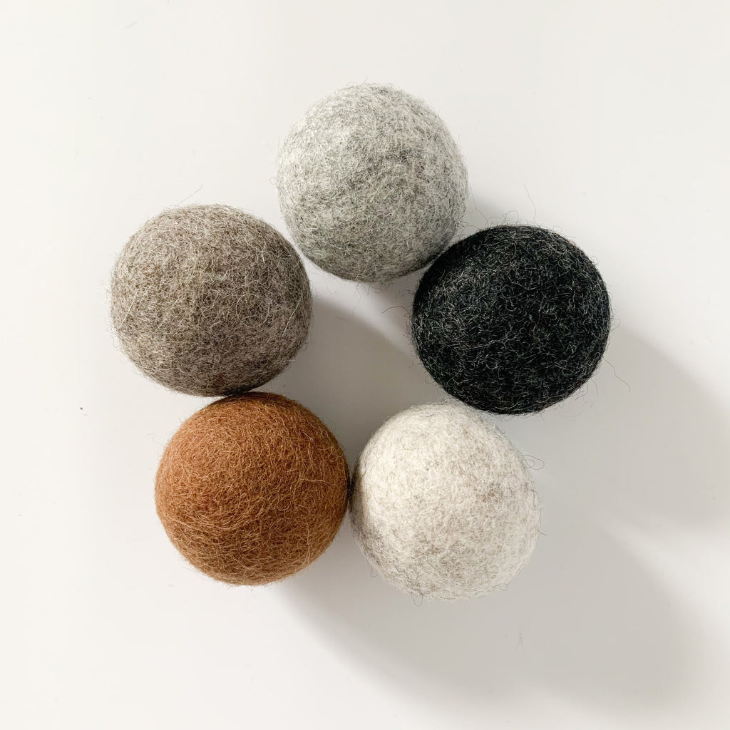 Large Wool Felt balls in marbled stone colours that can be used for play, dryer balls or decor 