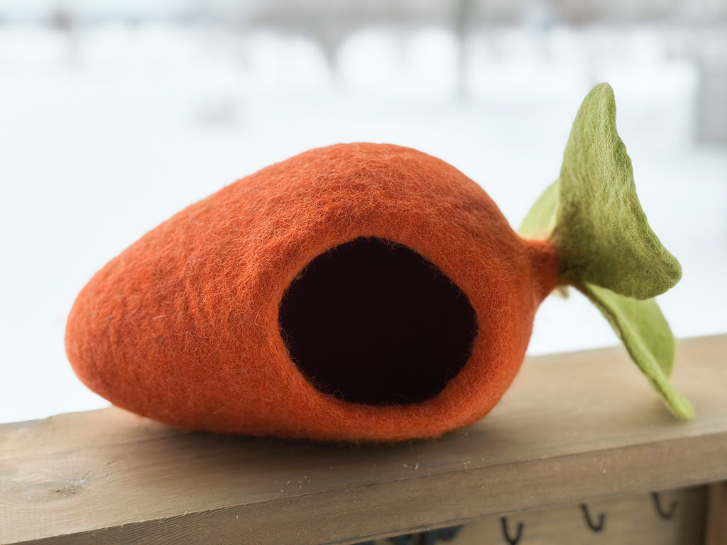 Felt small world Waldorf carrot play house for peg people and dolls. Available from a small shop in Canada. 